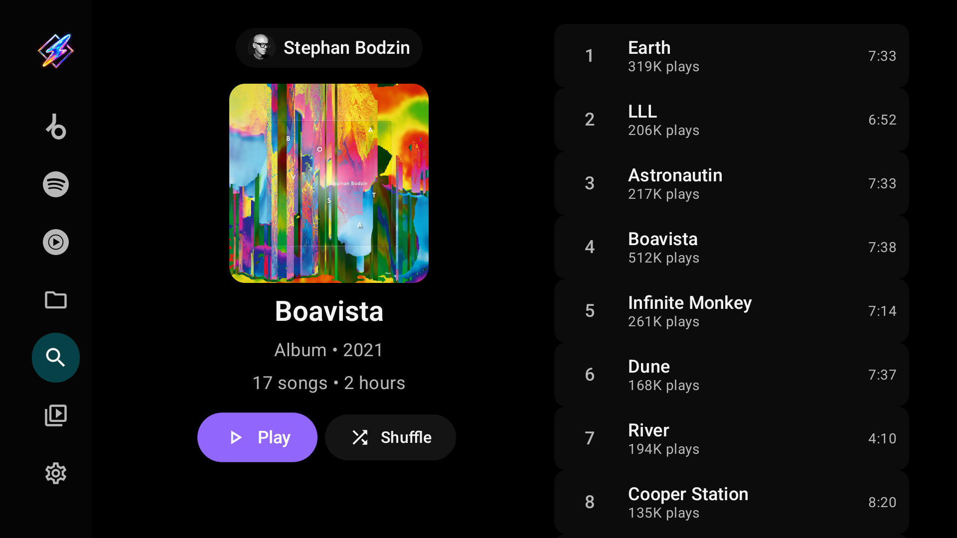 A YouTube Music album page: cover and buttons on the left, numbered tracks on the right